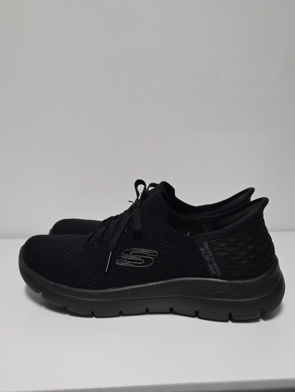 Skechers Women’s All-Black Knit Slip-On Athletic Sneakers